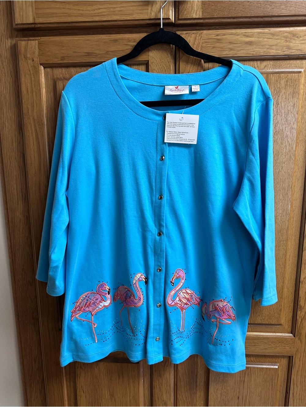 Woman’s Quacker Factory Turquoise Button-Front Flamingo Cardigan